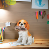 Sitting Dog with Brown Welcome Sign on Wooden
