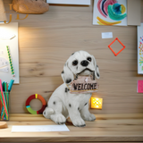 Sitting Dog with Brown Welcome Sign on Wooden