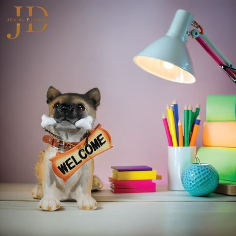 Sitting Dog with Orange Welcome Sign on Wooden