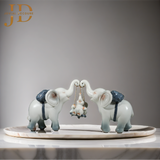 Elephant Family with Baby Swinging