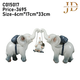 Elephant Family with Baby Swinging