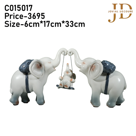 Elephant Family with Baby Swinging