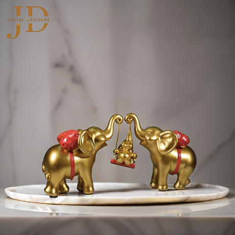Elephant Family with Baby Swinging