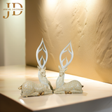 Sitting Couple Deer
